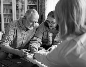 black and white photo of an interview with a couple